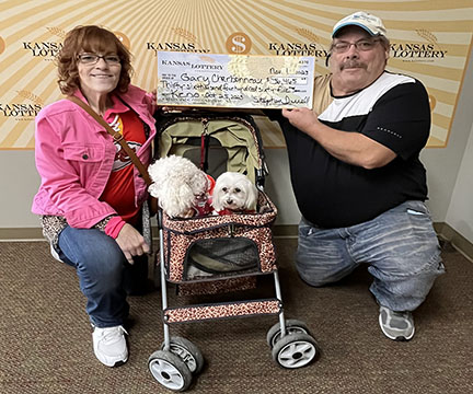 Photo of Gary and April Charbonneau with Punkie and Missy